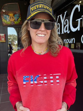 red hand bleached sweatshirt on girl with embroidered FIGHT on front