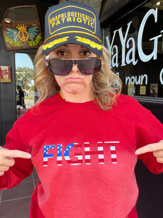 red hand bleached sweatshirt on girl with embroidered FIGHT on front